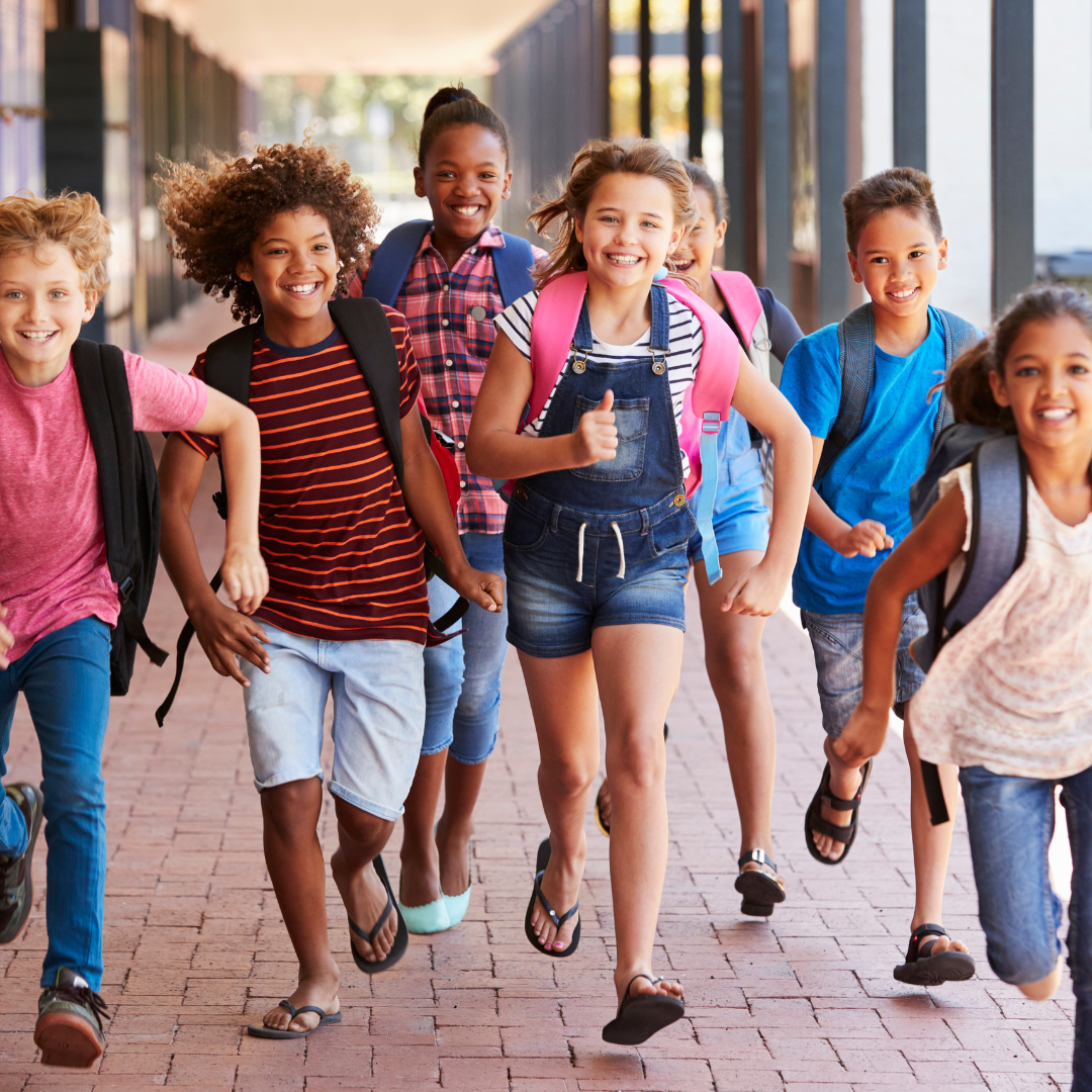 Kids running at school