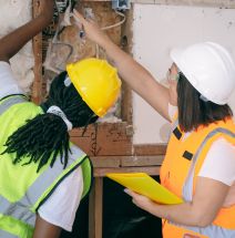 Home Inspectors looking at electrics