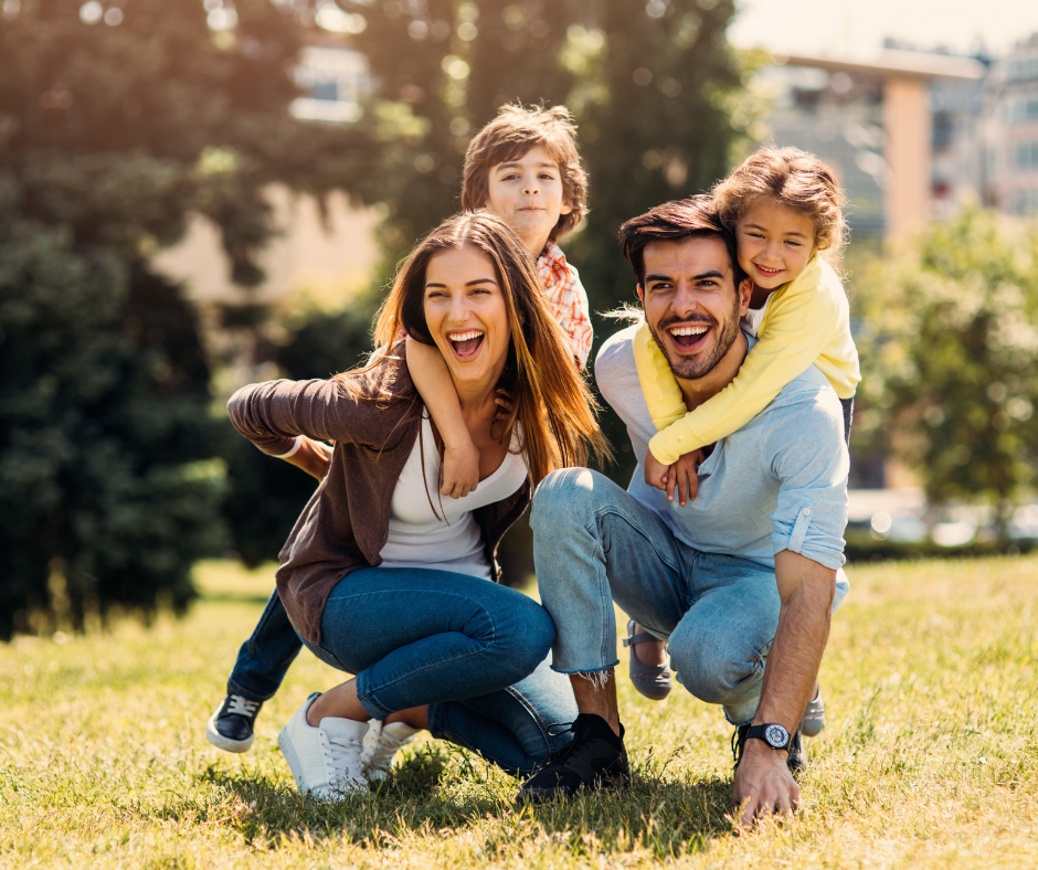 Young family having fun in a park