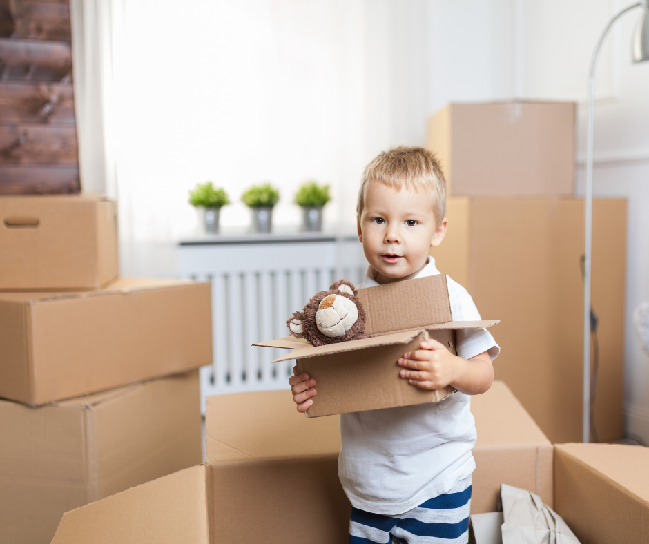 toddler helping on moving day